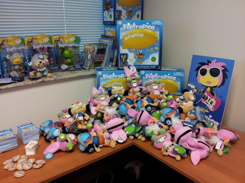 Some of our Poptropica merchandise hanging around our office. Now we just need to build a ball pit and fill it with plush toys.